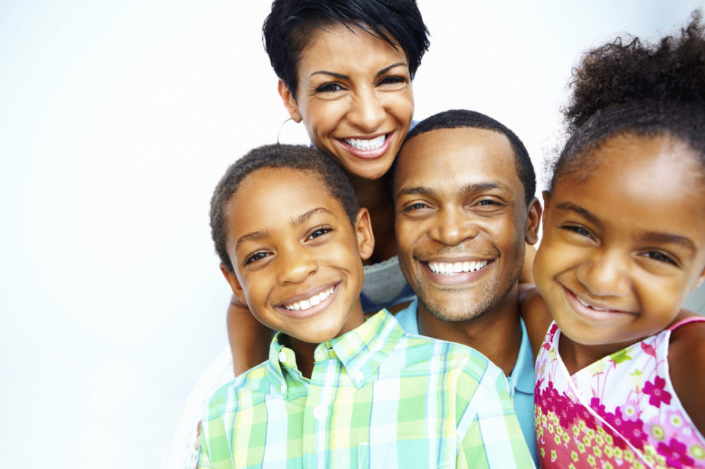 Happy African American couple with kids